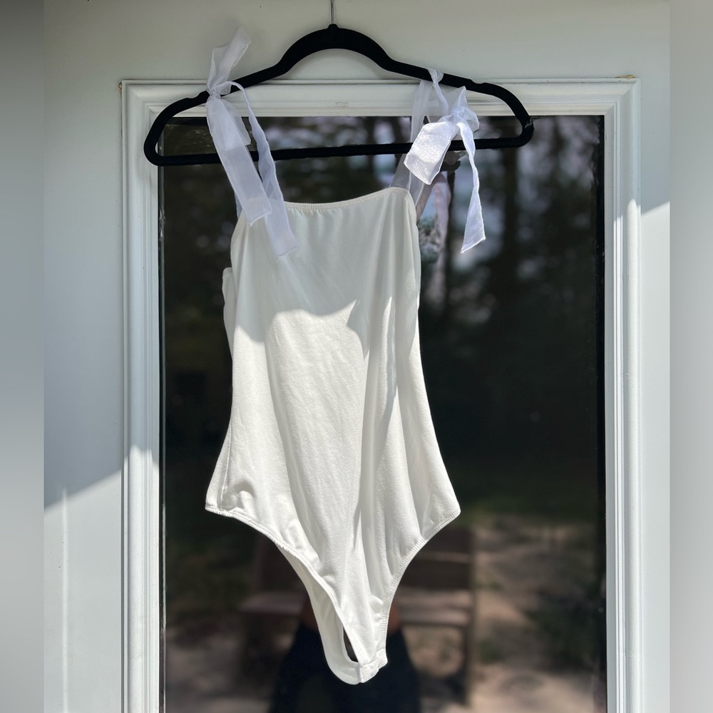 Vestique cream body suit - size S